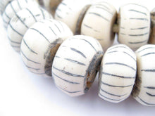 Load image into Gallery viewer, Large Carved Bone Beads, Lined White
